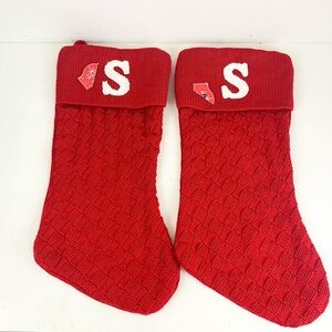 Two Red Knitted Christmas Stocking with S Initial